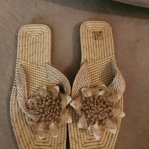 Elegant Tan Woven Sandals with Floral Detail